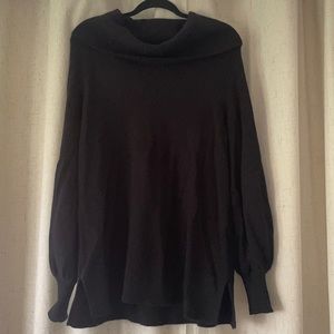 Great black sweater. Very soft. Mid-thigh on avg 5’6” frame